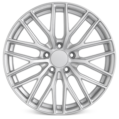 Silver alloy wheel rim on a white background